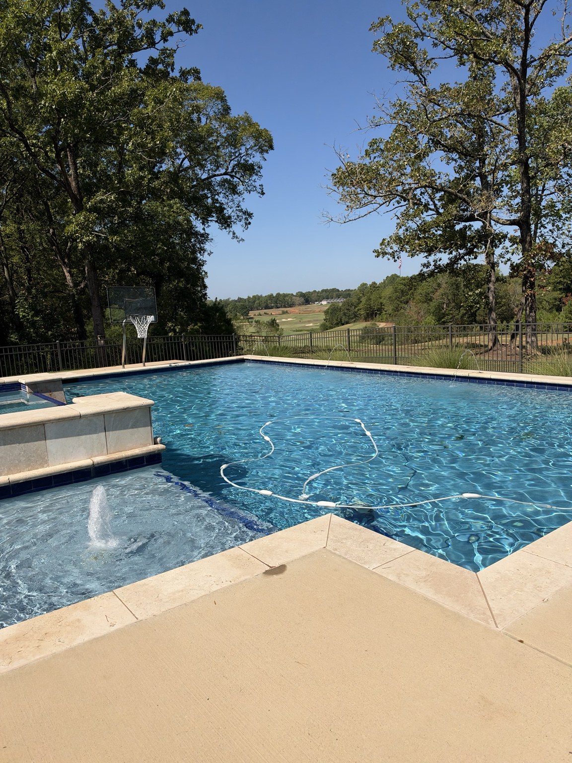 Blue Lagoon EcoFinish pool in Liberty City Texas seven years after installation
