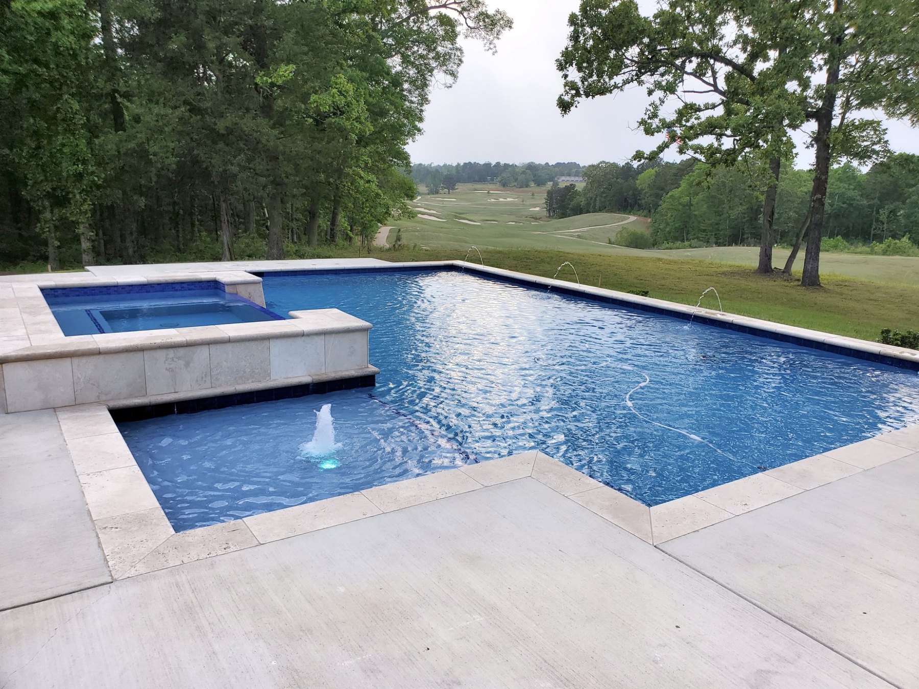 Completed swimming pool with EcoFinish Blue Lagoon interior