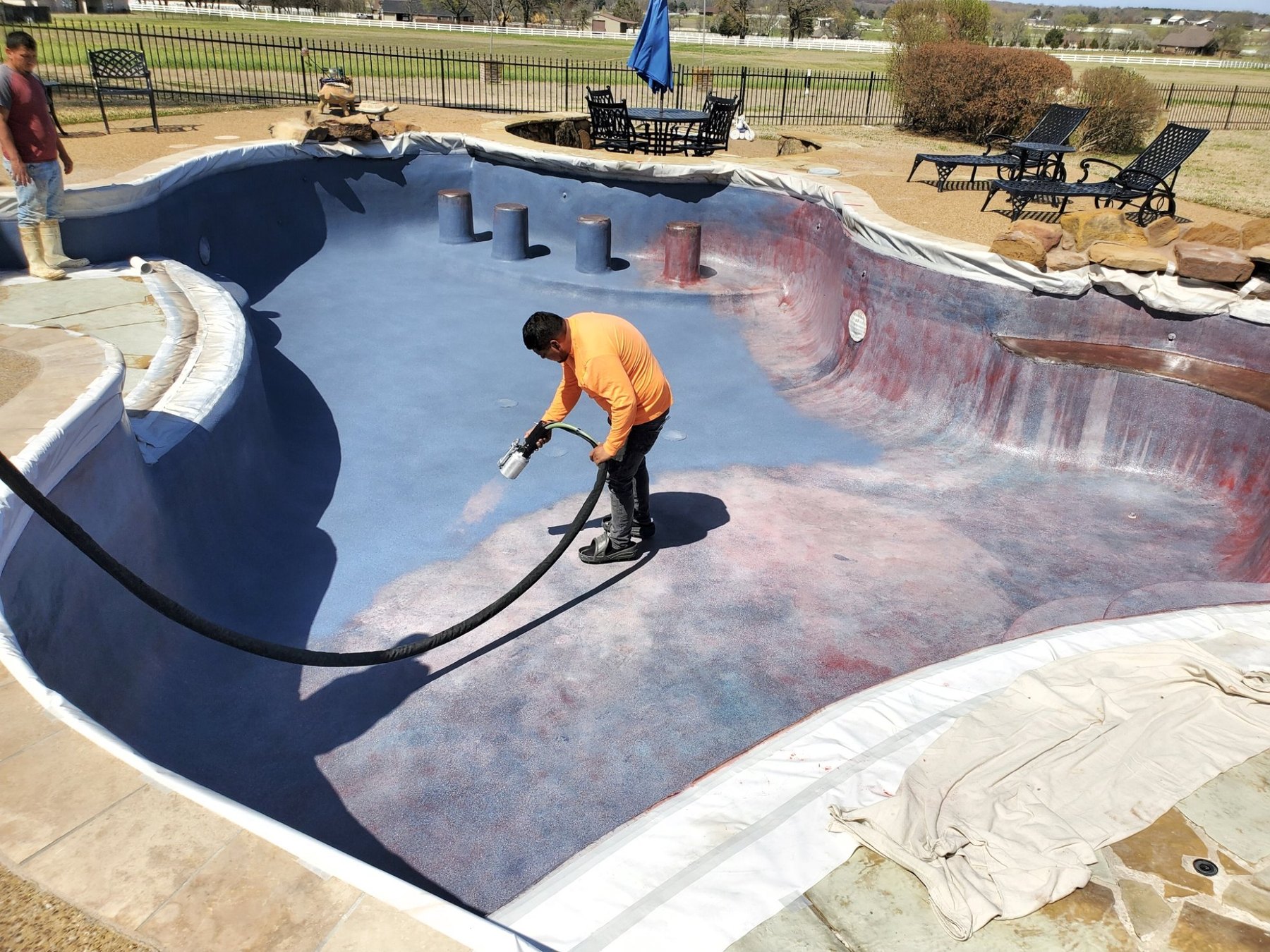 EcoFinish Mediterranean being applied during pool resurfacing in Lindale, Texas