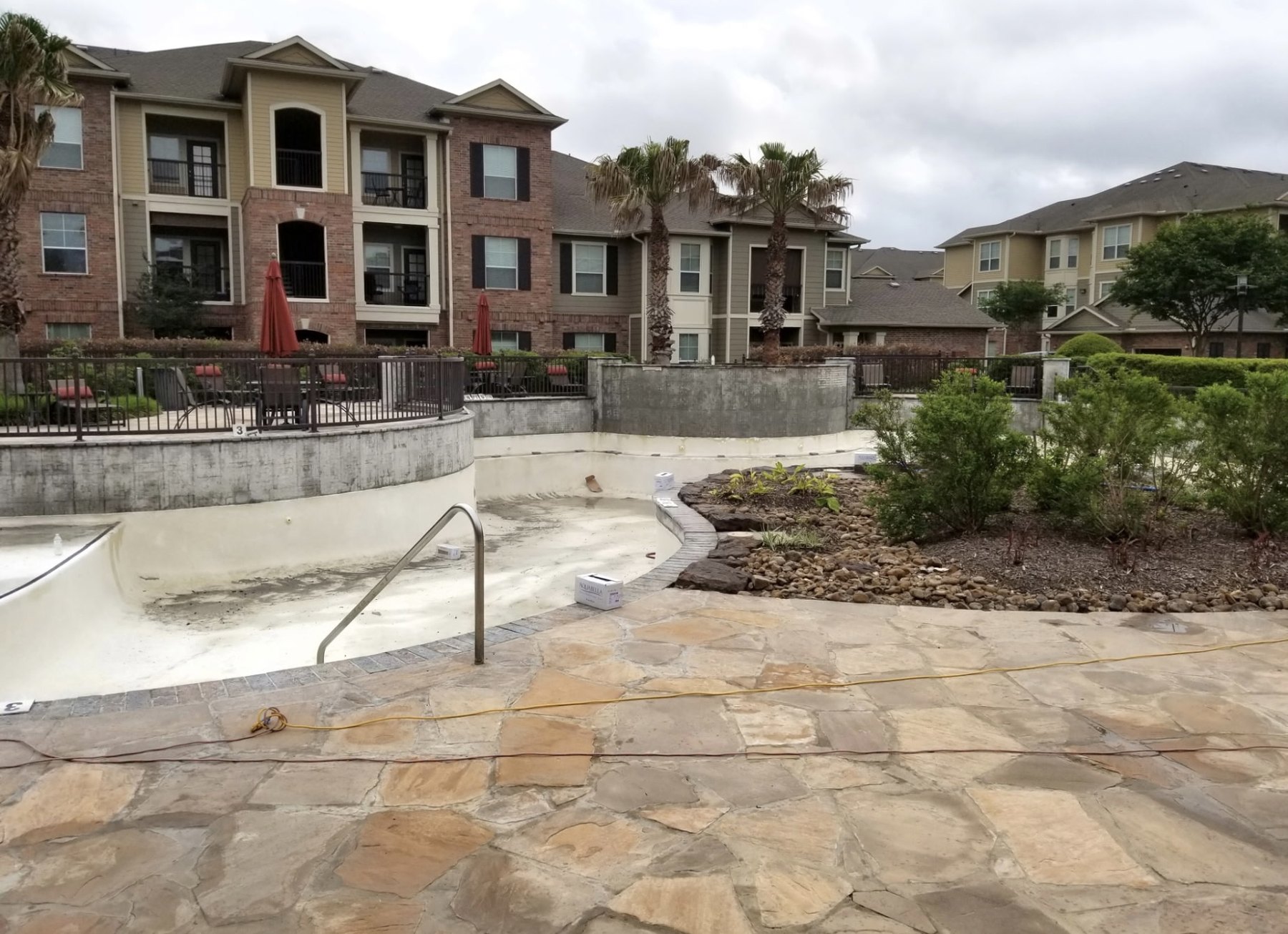 Houston commercial pool during marcite, tile and coping replacement