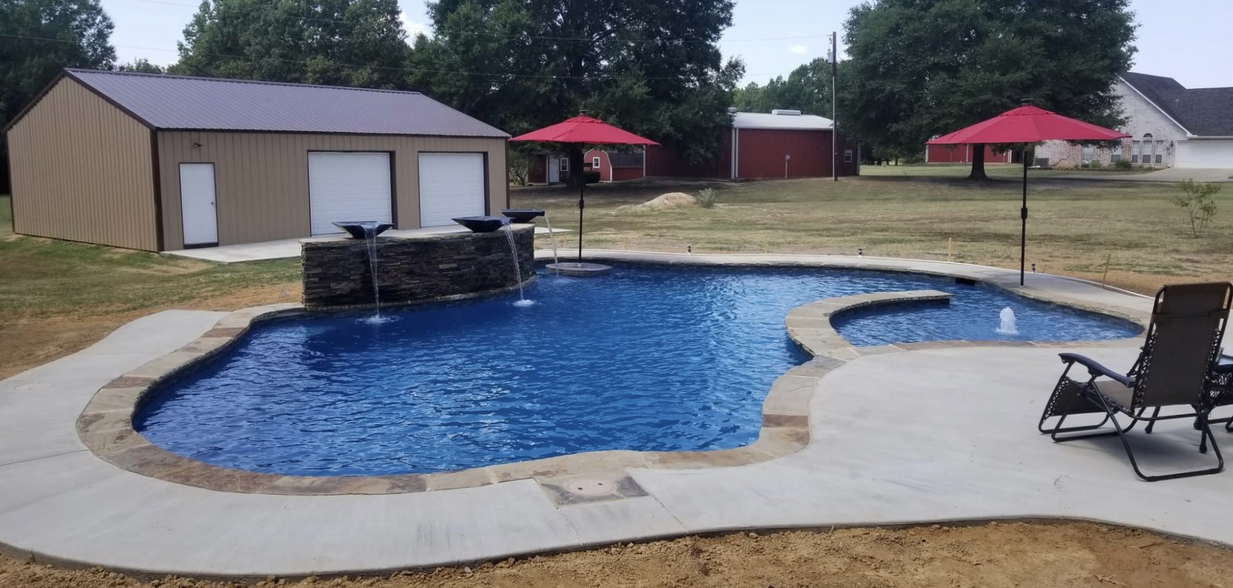 White marcite pool finish with 33% blue quartz in Bullard, Texas