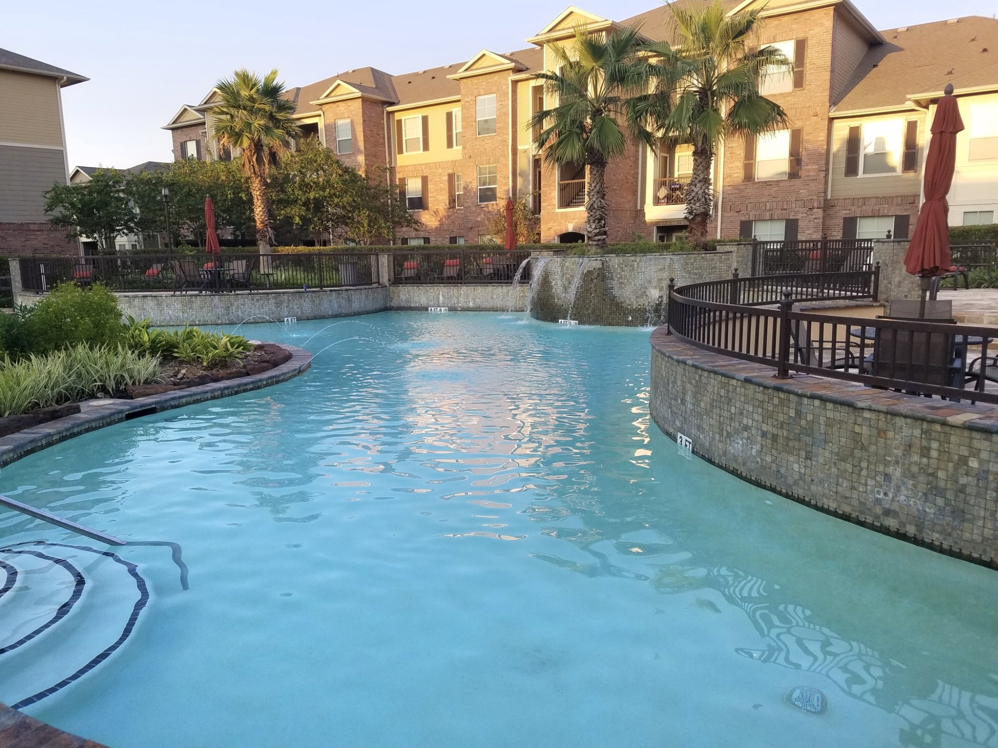 White Marcite — Commercial Pool at Sunset